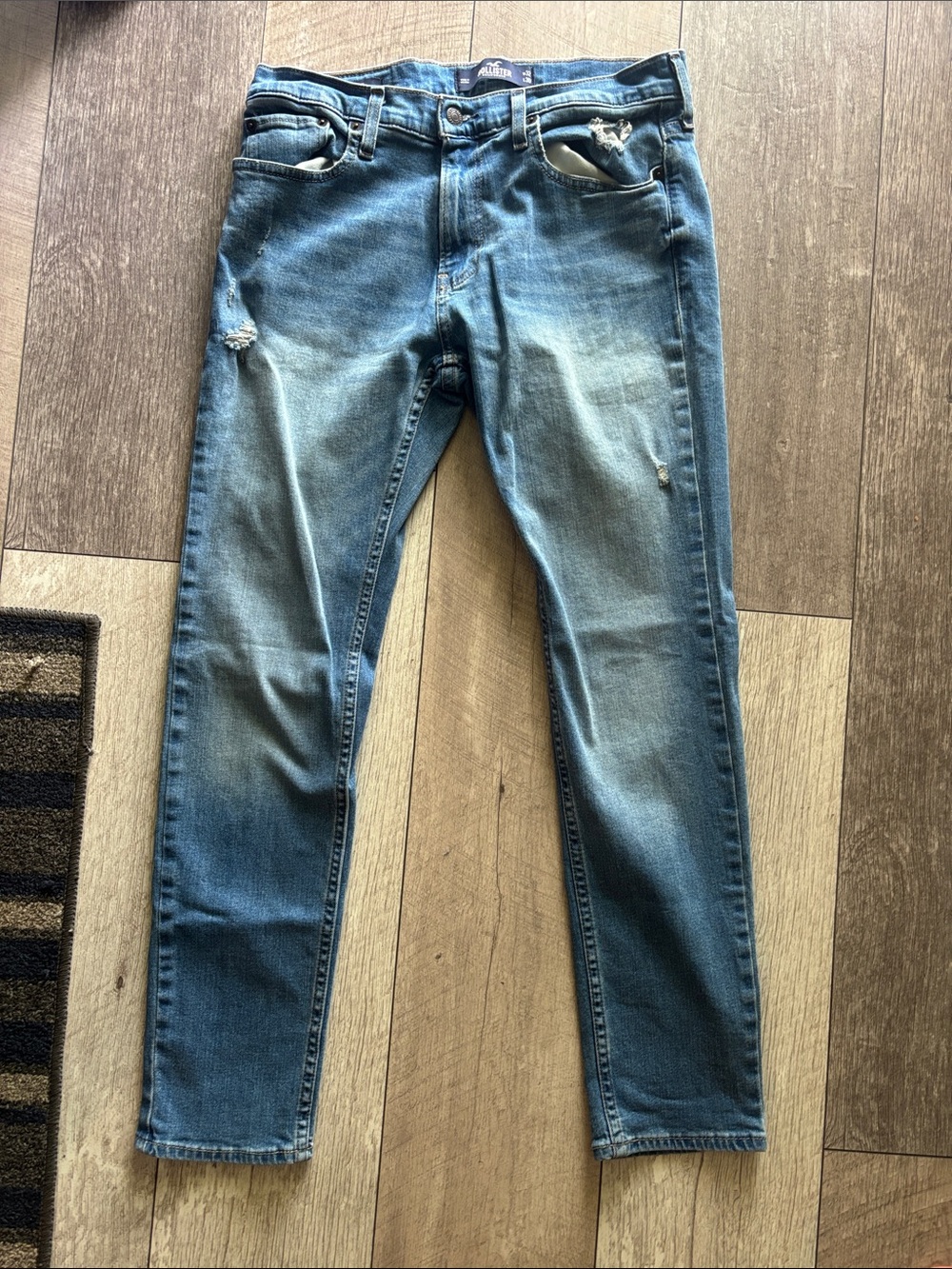 Slim Fit Men's Blue Jeans - Distressed Denim Holister
